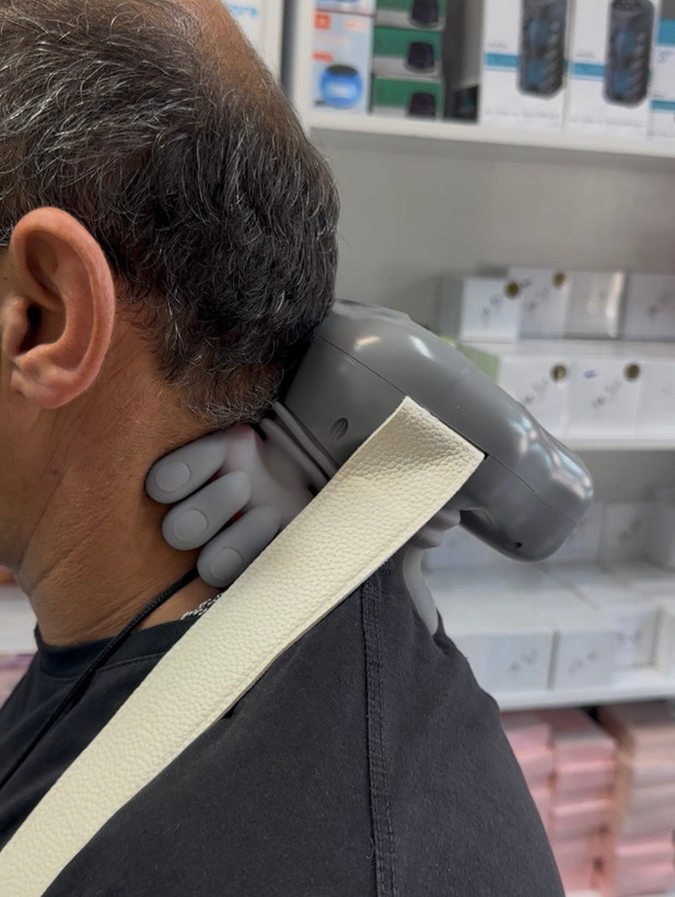ماساژور حرارتی گردن و شانه مدل شبیه ساز دست